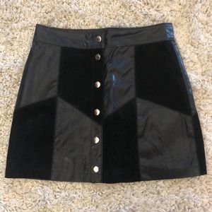 Leather and suede black mini skirt